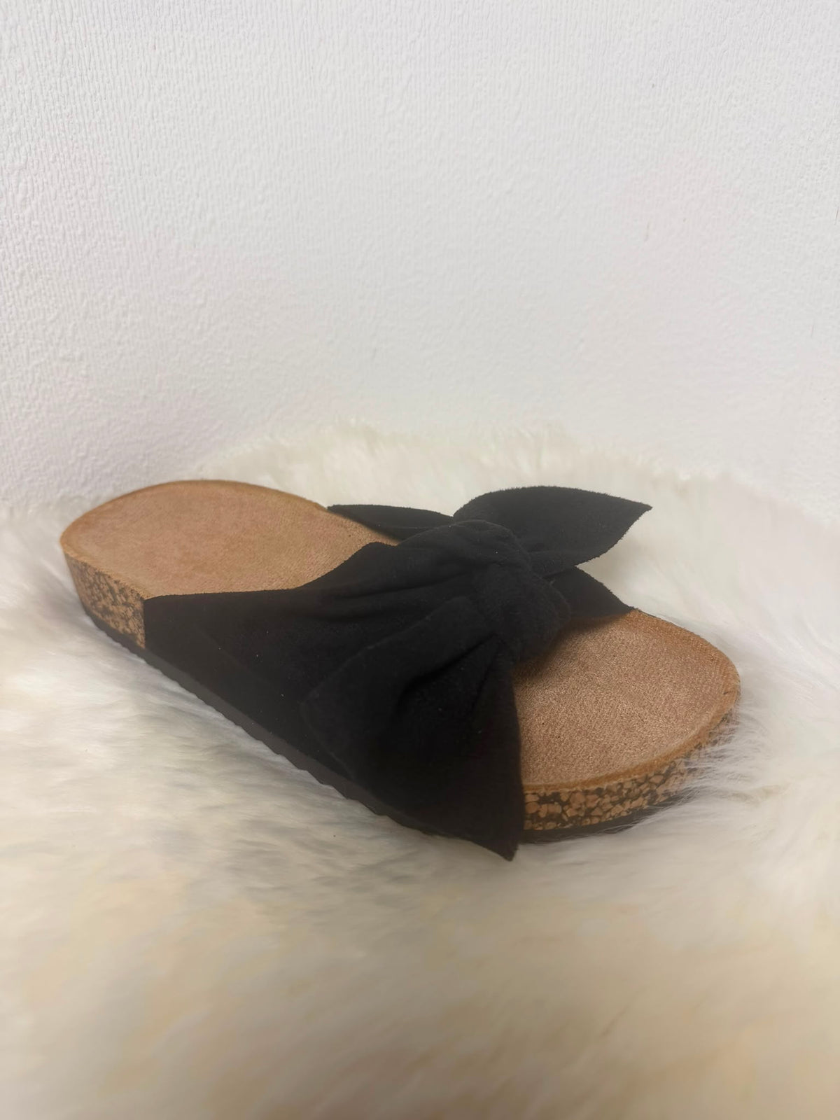Telma - zwarte slipper met grote strik